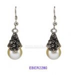 Carved pearls earring