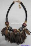 Leather links with feather charms