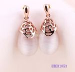 Hollowed rose style of stud earring