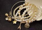 Beaded bracelet with coin,tower decoration