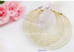 Exaggerated moon hoop earring