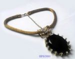 Metal necklace with black rhinestone pendant