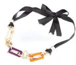Metal pendant necklace with black ribbon links