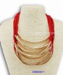 Red rope with gold plated tubes decoration