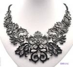 Hollowed design of metal bib necklace
