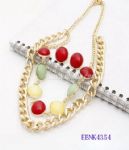 Metal necklace with resin decoration