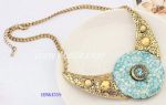 Metal necklace with resin rhinestone decoration