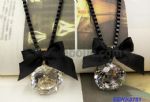 Rhinestone bowknit pendant necklace