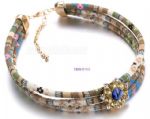 Snake skin tube shape design bib necklace with rhinestone decoration