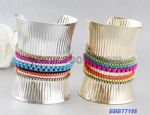 Metal wide bangle decoratet with colorful chain
