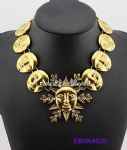 Gold plated face shapes metal necklace