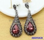 Vintage style of decorated ruby earrings