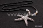 Sweater drop with starfish necklace
