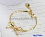 Metal chain bangle with enamel bowknot