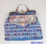 Sparkly clutch bag decorated with colorful rhinestone stones