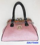 High-end handbags with clutch closure