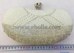 Luxurious clutch bags decorate with pearl and rhinestone